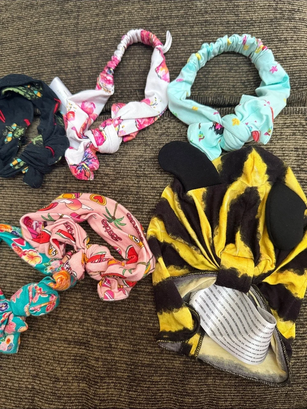 Baby headbands, hat, and bloomers from Posh Peanut and CocoMoon Hawaii